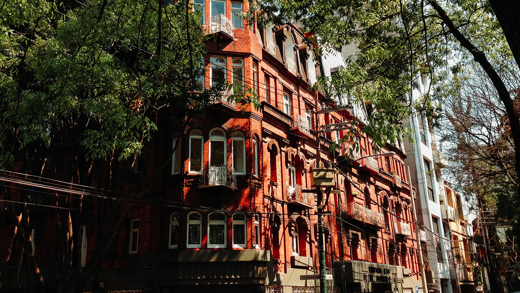 virgilio red building and trees