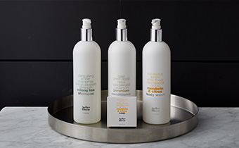 three large shampoo bottles